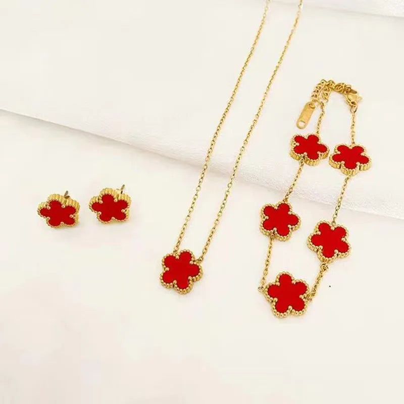 Schmuckset mit Pflaumenblüte – Edelstahl Halskette, Armband & Ohrringe für Damen!